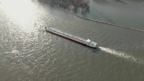 Aerial View Of A River With Moving Barges And Detailed Barge Close-Up. Video stock 297920147