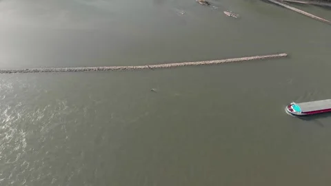 Aerial View Of A River With Moving Barges And Detailed Barge Close-Up. Video stock 297920598