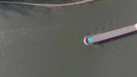 Aerial View Of A River With Moving Barges And Detailed Barge Close-Up. Video stock 297921028