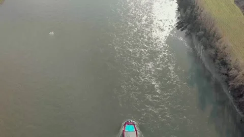 Aerial View Of A River With Moving Barges And Detailed Barge Close-Up. Video stock 297921058
