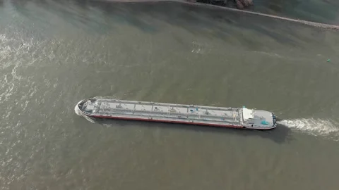 Aerial View Of A River With Moving Barges And Detailed Barge Close-Up. Stock Footage 297921635