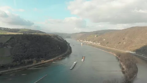 Aerial View Of River With Moving Barges, Trains, And Clouds Above. Stock Footage 297922050