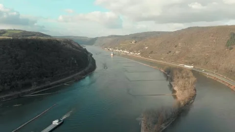 Aerial View Of River With Moving Barges, Trains, And Clouds Above. Stock Footage 297922225