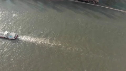 Aerial View Of A River With Moving Barges And Detailed Barge Close-Up. Stock Footage 297922308