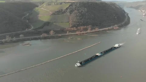 Aerial View Of River With Moving Barges, Trains, And Clouds Above. Stock Footage 297922725