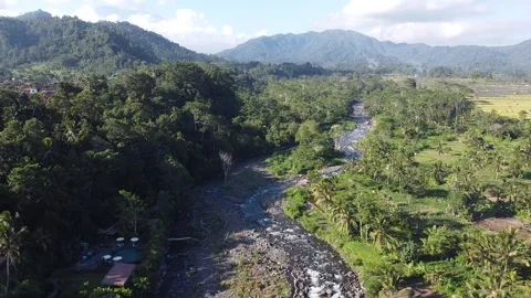 Aerial View of River, Rice Fields and Mountains in Sidemen Bali Indonesia Stockbeeldmateriaal 333169765