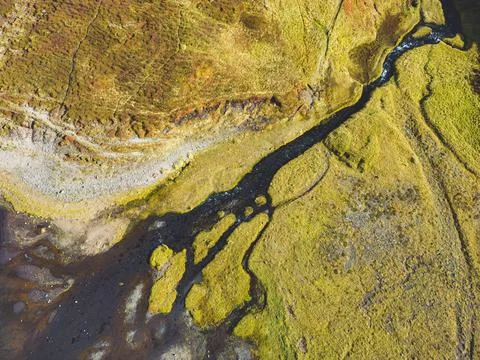 Aerial view of river running down into a small waterfall - Iceland, autumn 2022 Stock Photos