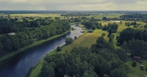 Aerial View of a River Running Through a Beautiful Countryside With Woods Stock Footage 127510051