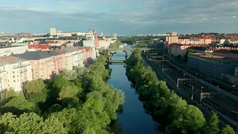 Aerial view of river running through Stockholm City &amp; Kungsholmen Stock Footage 135921906