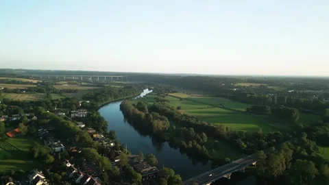 Aerial view of river running through green landscape Stock Footage 248767687