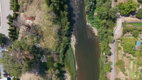 Aerial view of a river in Simitli, Bulgaria Stock Footage 343578702