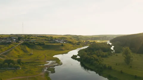 Aerial view of the river with smooth water and forest on the banks 動画素材 139322064