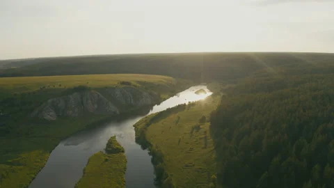 Aerial view of the river with smooth water and forest on the banks Stock Footage 139371837