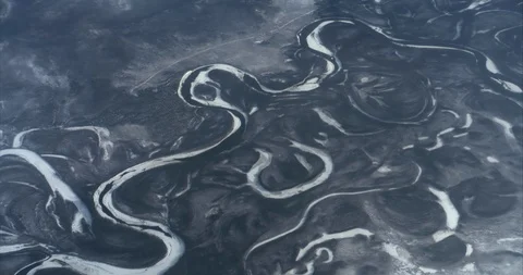 Aerial view of a river in the snow. Stock Footage 120030406