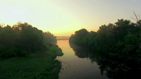 Aerial view of river at sunrise Stock Footage 99313893