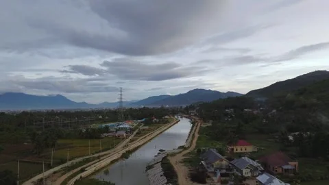 Aerial View of River with sunset background. Dramatic sky Stock Footage 277712579