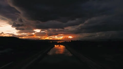 Aerial View of River with sunset background. Dramatic sky Stock-Footage 277713625