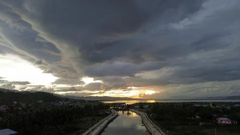 Aerial View of River with sunset background. Dramatic sky Stock Photos