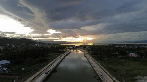 Aerial View of River with sunset background. Dramatic sky Stock Photos