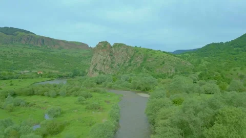 Aerial view of the river surrounded by high stony rocks. Dzoraget. Drone footage Stock Footage 257754926