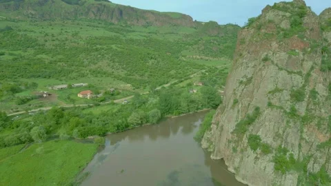 Aerial view of the river surrounded by high stony rocks. Dzoraget. Drone footage Video stock 257755520