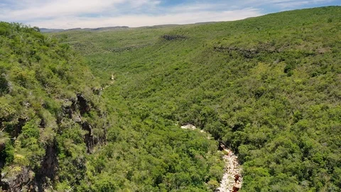 Aerial view of river surrounded by jungle and rocks, Chapada Diamantina - Brazil Stock Footage 117043952