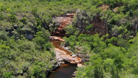 Aerial view of river surrounded by jungle and rocks, Chapada Diamantina - Brazil Stock-Footage 117045689