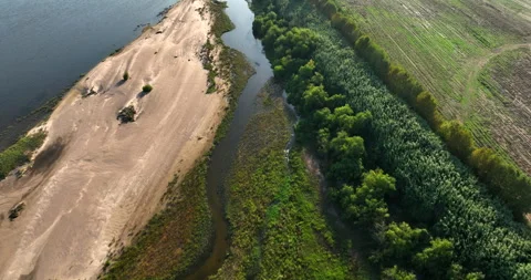 Aerial view of river Tejo in Chamusca, Ribatejo, Portugal. Drone flies over Stock Footage 255249656