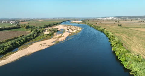 Aerial view of river Tejo in Chamusca, Ribatejo, Portugal. Drone flies over Stock Footage 255298731
