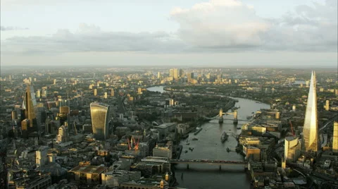 Aerial view of the River Thames and Shard Skyscraper London UK Stock Footage