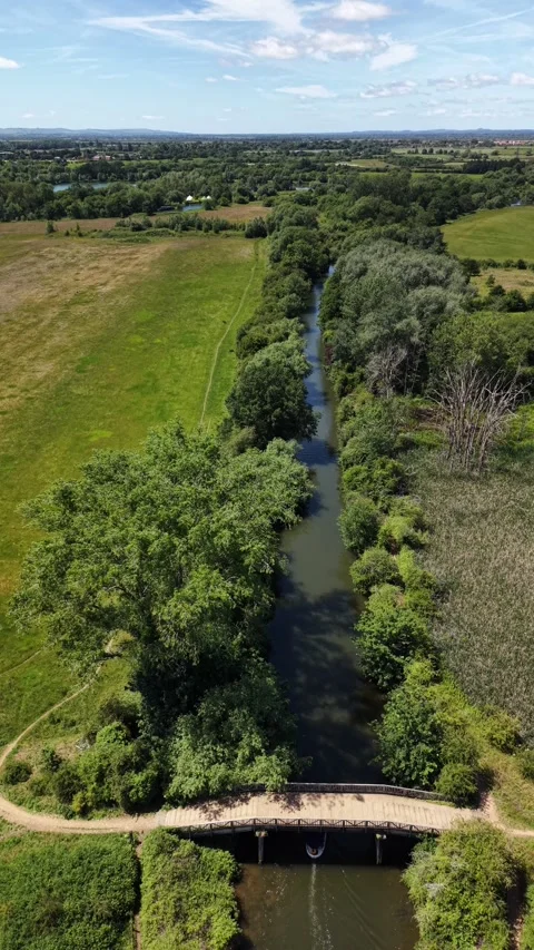 Aerial View of the River Thames Flowing Through Culham, Oxfordshire Stock Footage 336891468