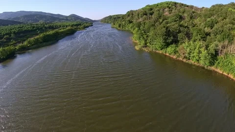 Aerial view of river through green landscape Stock Footage 336465969
