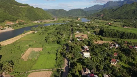 Aerial view of river valley and village in Vietnam Stock Footage 339753605