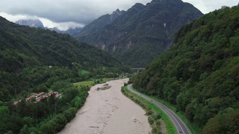 Aerial view of river in the valley between mountains Stock Footage 143390920
