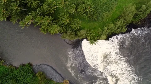 Aerial view of river water encountering agitated ocean, Hawaii, U.S.A. Video stock 102140697