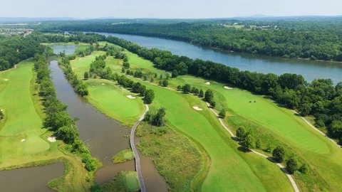 Aerial View of Riverfront Golf Course on Sunny Summer Day Stock Footage 346185393