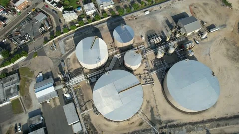 Aerial View of a Riverfront Refinery Stock Footage 163780377