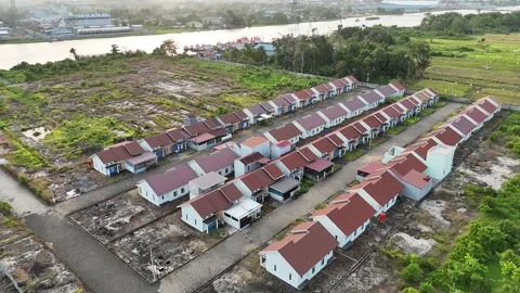 Aerial View of Riverside Housing Complex and Riverboats Video stock 347391340