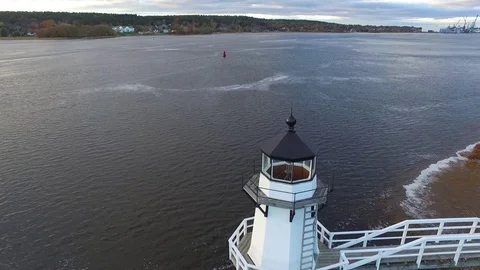 Aerial View of a Riverside Lighthouse Video stock 97545318