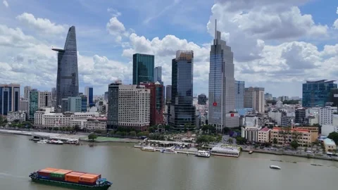 Aerial view of Riverside park, Bitexco tower and Hotel Majestic Saigon. Stock Footage 340307659
