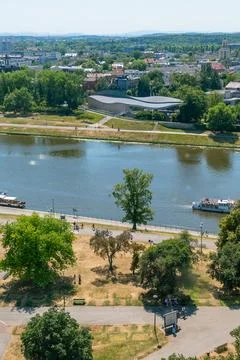 Aerial view of riverside park with pathways and trees in summer. Krakow Stock Photos