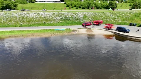 Aerial View of Riverside Park with Walking Path Stock Footage 296547848