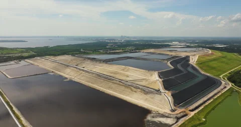 Aerial view of Riverview phosphogypsum stack, large open air phosphogypsum waste Stock Footage 248363624