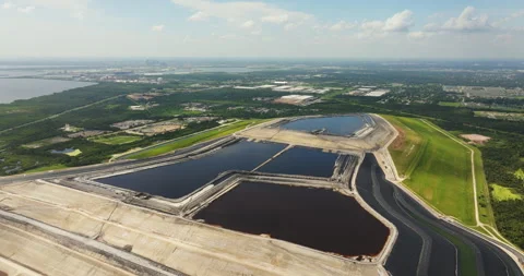 Aerial view of Riverview phosphogypsum stack, large open air phosphogypsum waste Stock Footage 252287363
