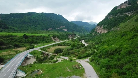 Aerial view on a road and mountains Video stock 101728009