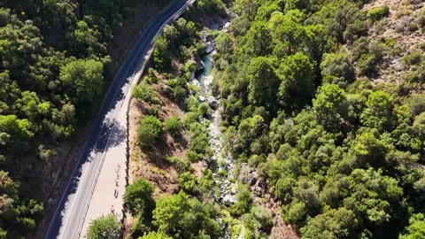Aerial view of road and river gorge with rapids, Benahavis, Spain Stock Footage 339579747