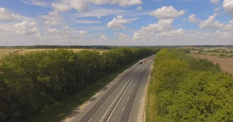 Aerial view of road between fields Stock Footage 93643250