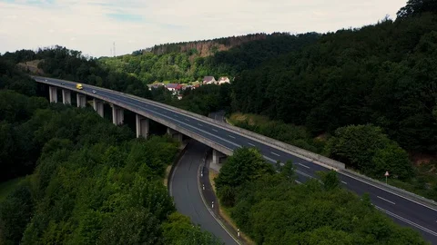 Aerial view of road between forest in Germany Video stock 127658356