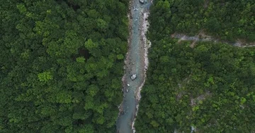 Aerial view of a road bridge from river in the mountains Stock Footage 85911246