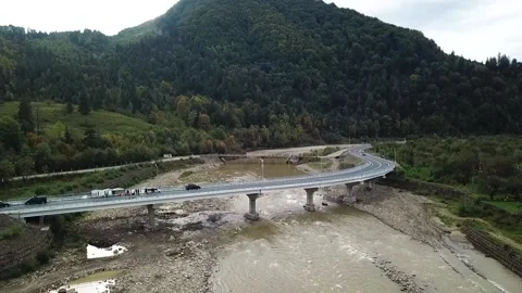 Aerial view of a road bridge under construction. road and bridge under Stock Footage 229432267